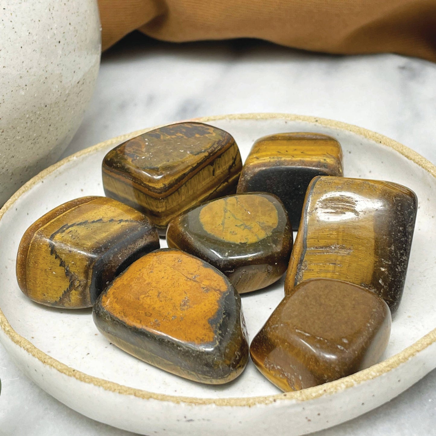 Subject II Change - Polished Tigers Eye stones