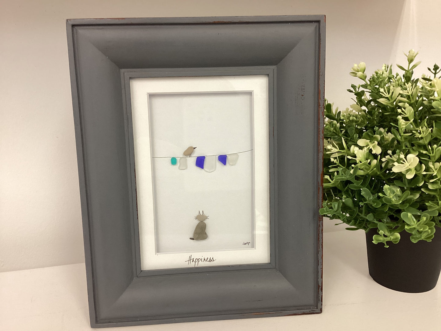 The Whispering Pebble- Framed Art